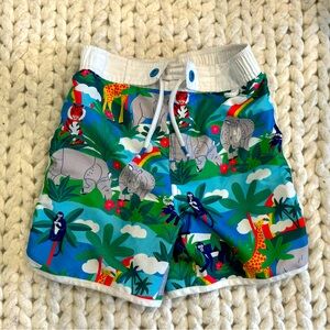 Swim trunks with multicolored jungle animal print. 6-7y